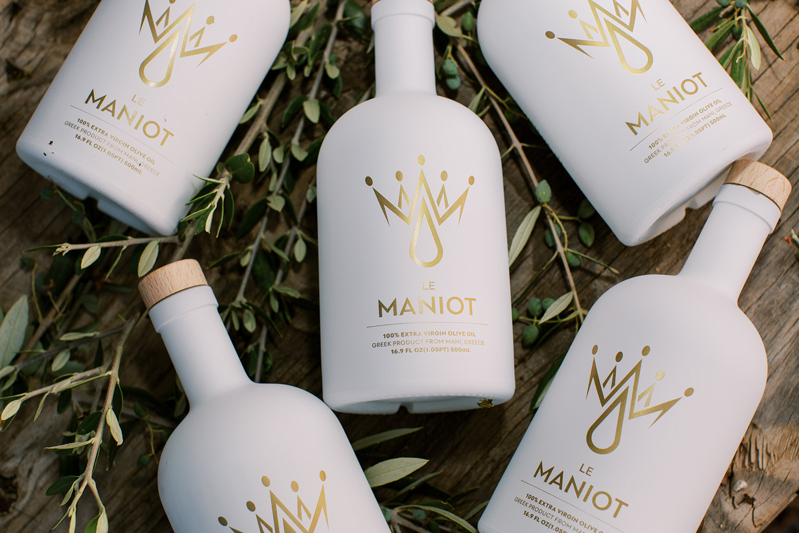 Five elegant olive oil bottles.